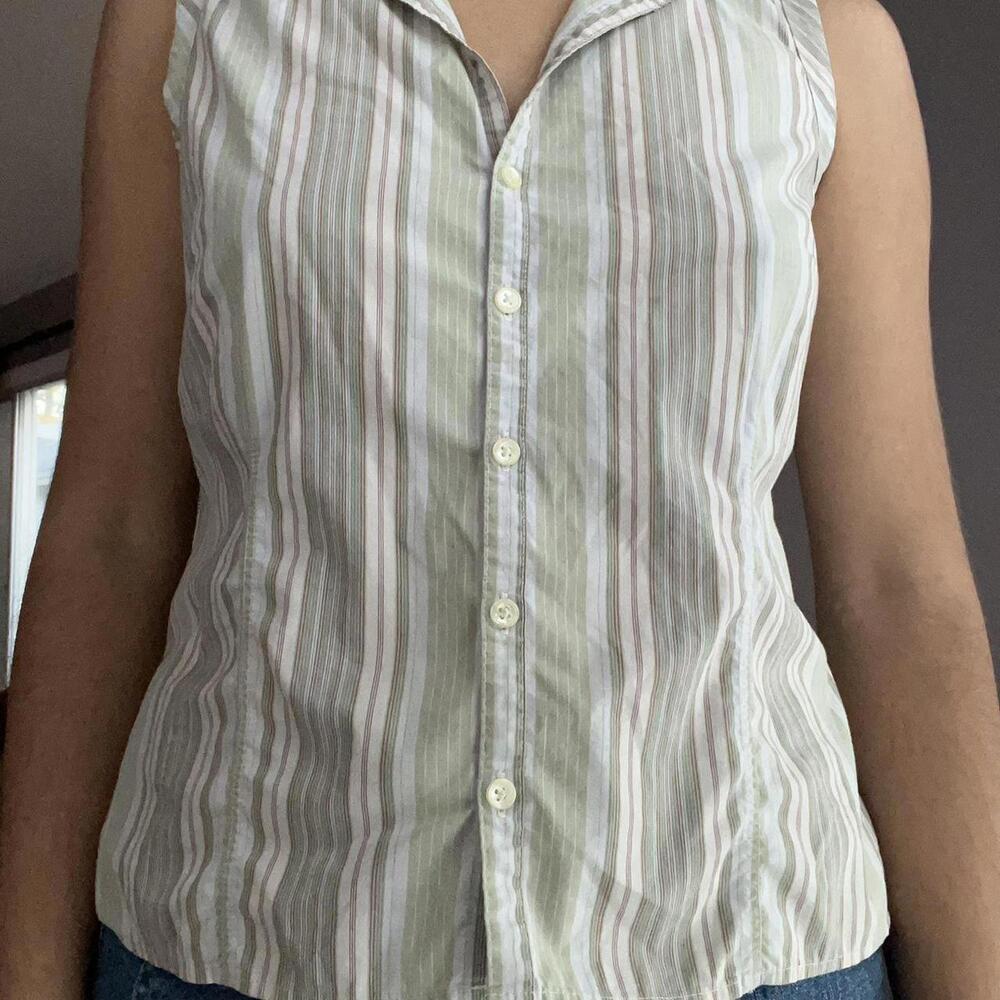 Sleeveless collared white and green striped blouse